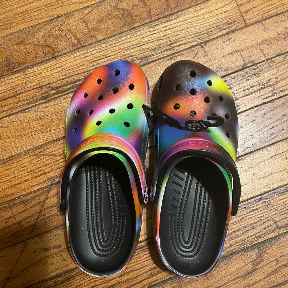 Crocs:  Classic solstices clog, unisex men size 7, women size 9, multi color
